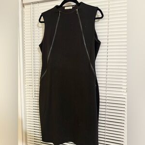 Calvin Klein “Little Black Dress” Size—10/12
Spandex/Cotton
In good condition